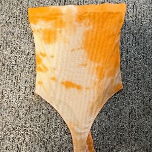Orange tie dye bodysuit